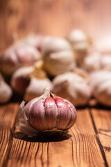 white garlic on wooden table