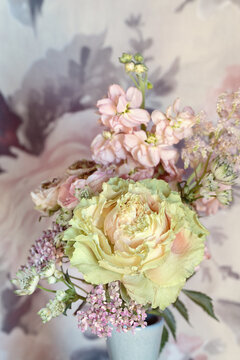 Beautiful bouquet of spring flowers in a vase on the table. Lovely bunch of flowers .Soft focus.
