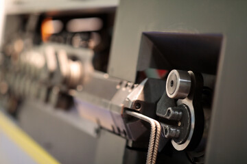 close up of CNC wire bending machine
