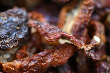 Selective focus on dried tomatoes on a market in Spain.