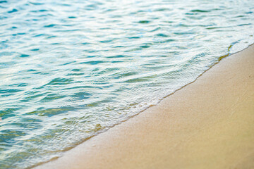 sandy shore and water closeup
