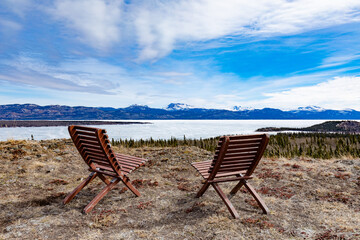 View point chairs on Lake Laberge Yukon T Canada