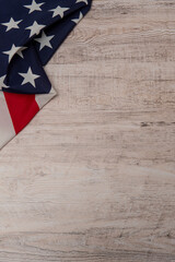 vertical photo of united states flag stars in upper left corner on wooden background