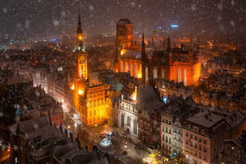 Fototapeta na wymiar Night scenery of the Main Town of Gdansk during snowfall, Poland