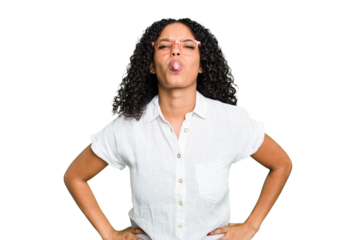 Young cute brazilian woman isolated funny and friendly sticking out tongue.