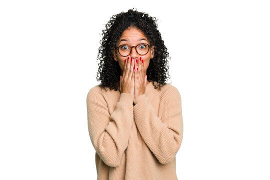 Young cute brazilian woman isolated shocked, covering mouth with hands, anxious to discover something new.
