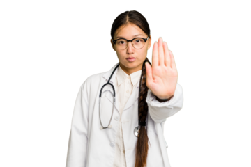 Young doctor asian woman isolated standing with outstretched hand showing stop sign, preventing you.