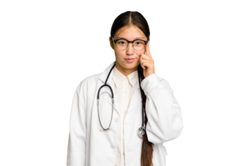 Young doctor asian woman isolated pointing temple with finger, thinking, focused on a task.