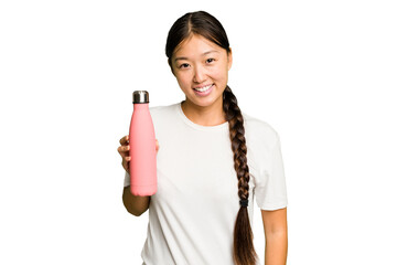 Young asian woman holding a pink thermo isolated happy, smiling and cheerful.