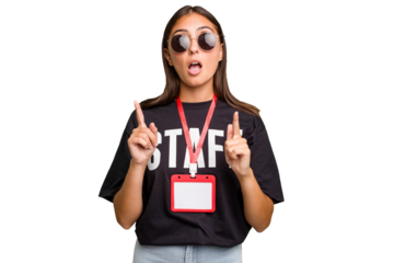 Young caucasian staff woman wearing a badge isolated pointing upside with opened mouth.