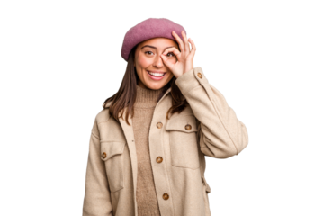 Young caucasian woman wearing winter jacket isolated excited keeping ok gesture on eye.