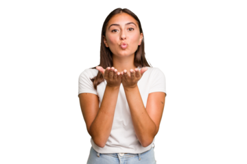 Young cute caucasian woman isolated folding lips and holding palms to send air kiss.