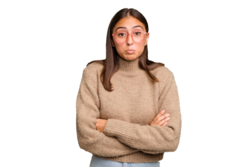 Young cute caucasian woman isolated blows cheeks, has tired expression. Facial expression concept.