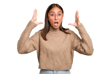 Young cute caucasian woman isolated celebrating a victory or success, he is surprised and shocked.