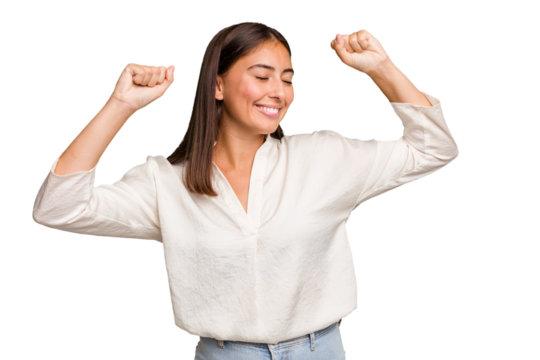 Young cute caucasian woman isolated celebrating a special day, jumps and raise arms with energy.