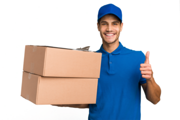 Young delivery caucasian man holding boxes isolated smiling and raising thumb up