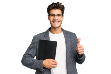 Young teacher caucasian man holding a book isolated smiling and raising thumb up