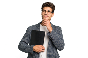Young teacher caucasian man holding a book isolated looking sideways with doubtful and skeptical expression.