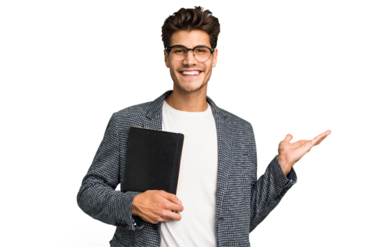 Young teacher caucasian man holding a book isolated showing a copy space on a palm and holding another hand on waist. - Powered by Adobe