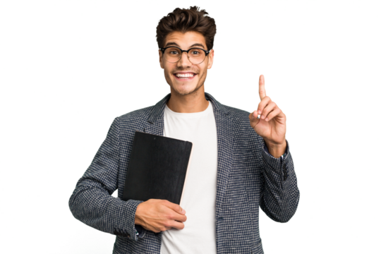Young teacher caucasian man holding a book isolated showing number one with finger.