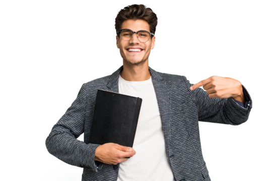 Young teacher caucasian man holding a book isolated person pointing by hand to a shirt copy space, proud and confident