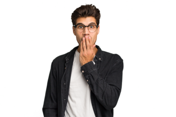 Young caucasian handsome man isolated shocked, covering mouth with hands, anxious to discover something new.