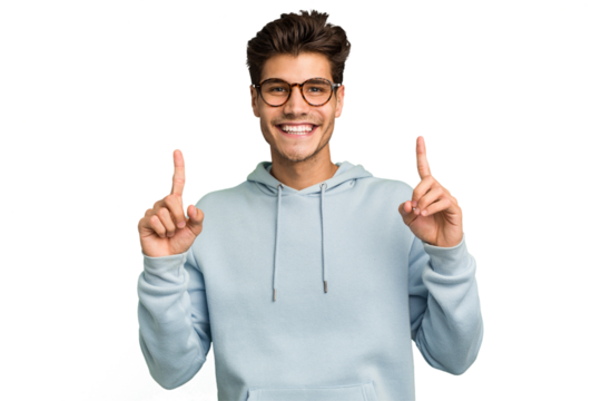 Young caucasian handsome man isolated indicates with both fore fingers up showing a blank space.