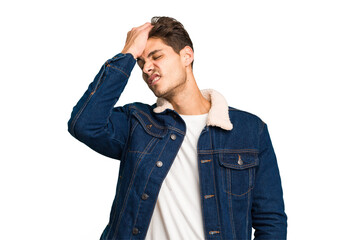 Young caucasian handsome man isolated forgetting something, slapping forehead with palm and closing...