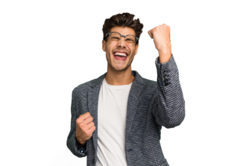 Young caucasian handsome man isolated cheering carefree and excited. Victory concept.