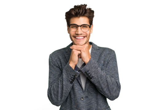 Young caucasian handsome man isolated keeps hands under chin, is looking happily aside.