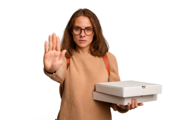 Young student woman holding pizzas isolated standing with outstretched hand showing stop sign, preventing you.