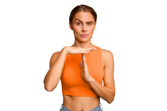 Young caucasian woman isolated showing a timeout gesture.