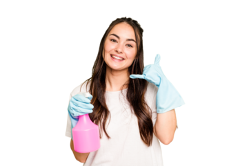 Young cleaner caucasian woman isolated on green chroma background showing a mobile phone call gesture with fingers.
