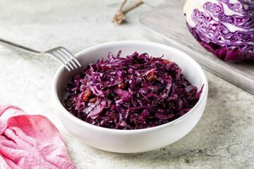 Braised red cabbage with onion, raisins, vinegar and wine.