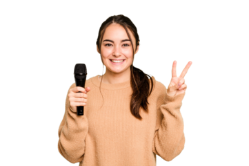 Young caucasian singer woman isolated on green chroma background showing number two with fingers.