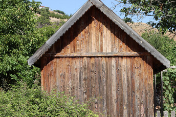 Fototapeta na wymiar small wooden hut on the farm
