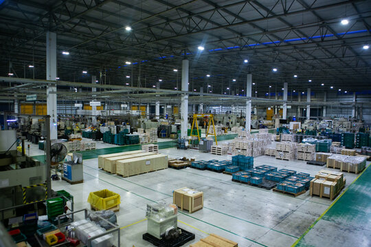 The warehouse for keeping material and finished goods of automotive parts for cars and tractors in Thailand. Manufacturing storage.