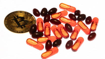 Bitcoin (BTC) obverse, cryptocurrency, gold coin white background. Blockchain payment system and drugs (pills) isolated
