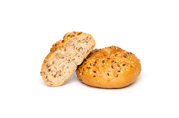 Traditional kaiser roll bun with linseeds and sesame seeds isolated on white background