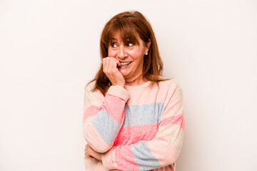 Middle age caucasian woman isolated on white background biting fingernails, nervous and very anxious.