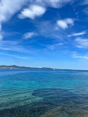 Fototapeta na wymiar Deep blue seascape, blue sea and blue sky, natural background