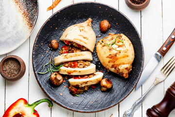 Grilled squid with vegetables, stuffed calamari.