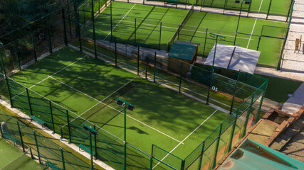 Aerial view of a sports center with three five-a-side football pitches in synthetic grass