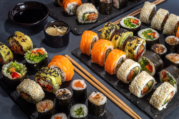Sushi set on dark slate background