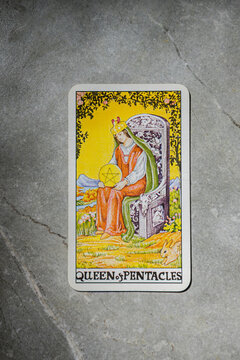 November 18, 2022 - Kyiv, Ukraine. Ryder's Tarot - Waite. The Minor Arcana of the suit of pentacles. QUEEN