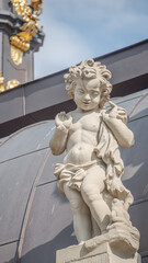 Old royal renaissance and rococo sculptures in Zwinger gardens at historical and museums downtown...