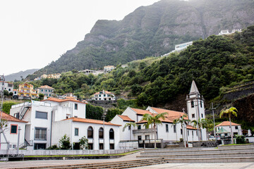Fototapeta na wymiar Buildings and a church in Sao Vicente, Madeira