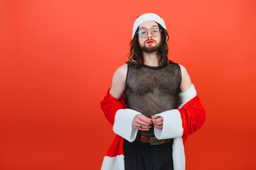 New Year's gay party. A gay man in a Santa suit. LGBT concept.