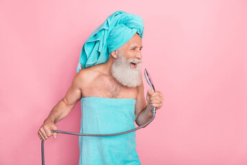 Photo of funny retired pensioner imagine pop singer sing in bath room isolated on pastel color...