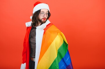 New Year's gay party. A gay man in a Santa suit. Equality. LGBT community.